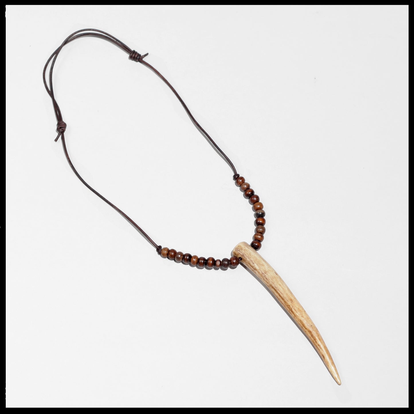 5.5” Deer antler necklace w/ brown bone & wood beads