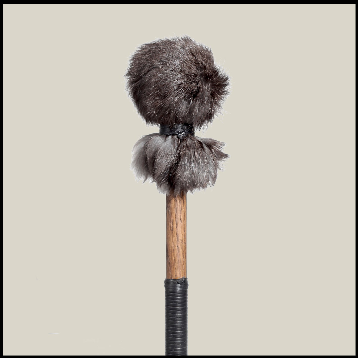 13” Soft drum beater, dark grey Rabbit fur, 3/4” Red Oak handle w/ black leather wrap