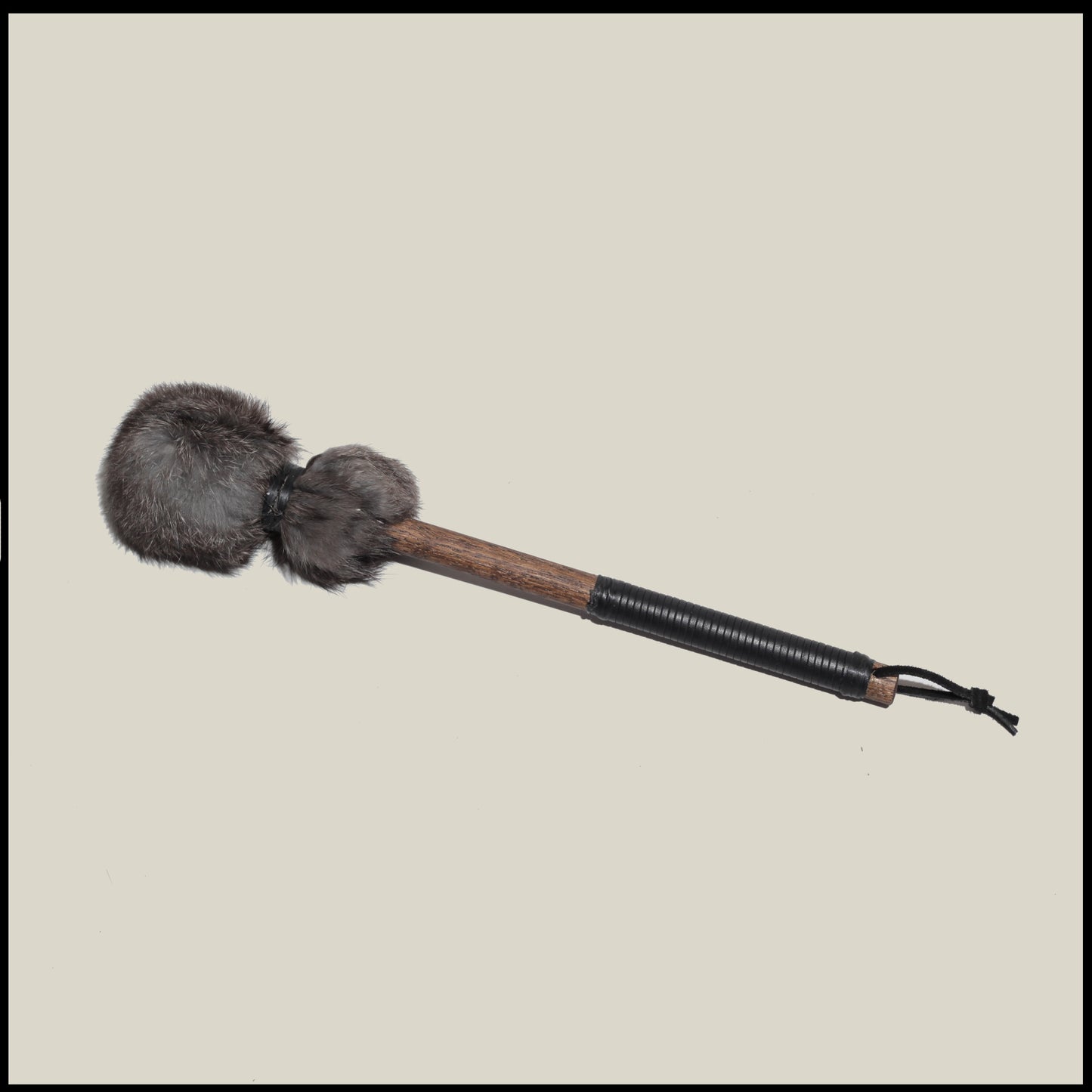 13” Soft drum beater, dark Rabbit fur, 5/8” Red Oak handle w/ black leather wrap 60$