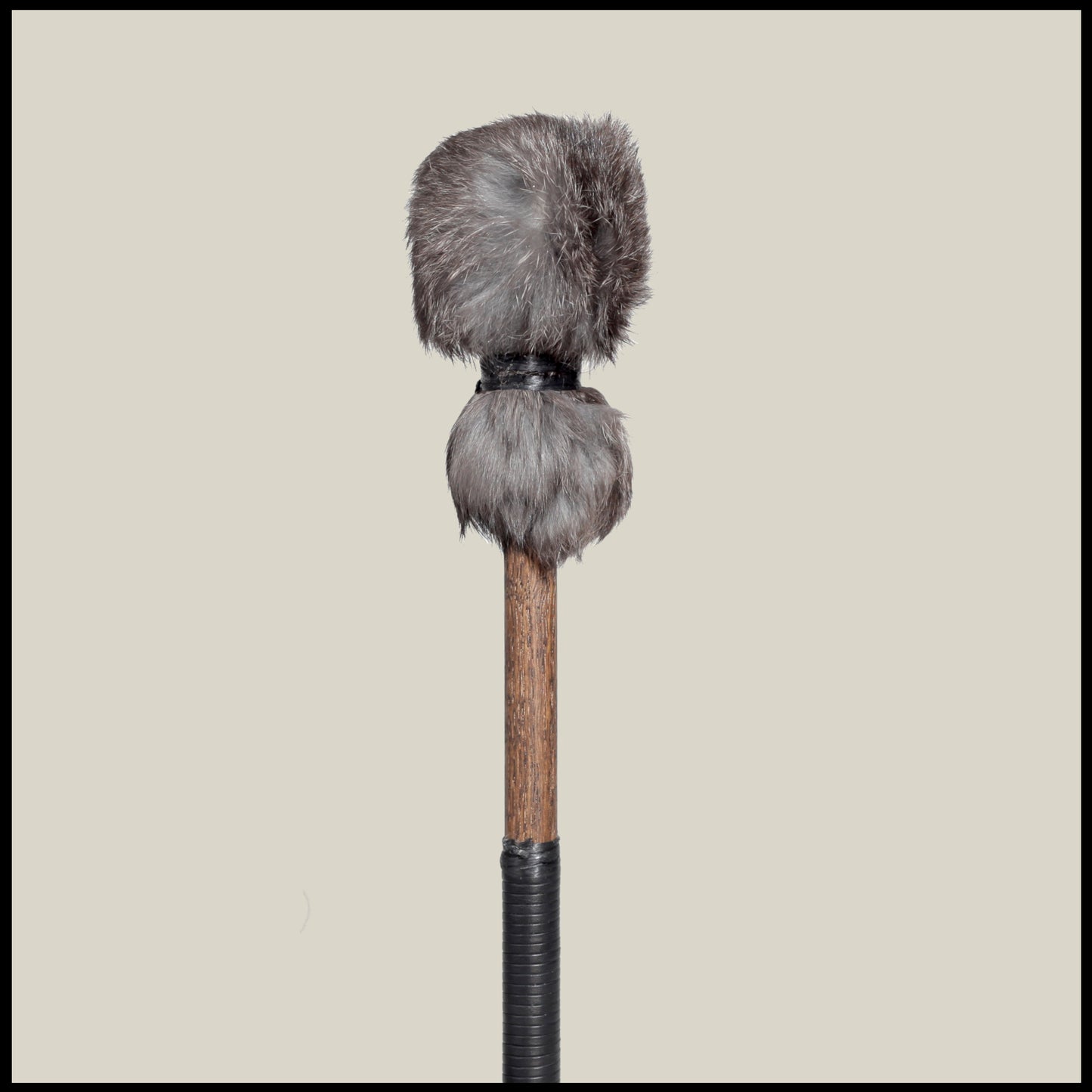 13” Soft drum beater, dark Rabbit fur, 5/8” Red Oak handle w/ black leather wrap 60$