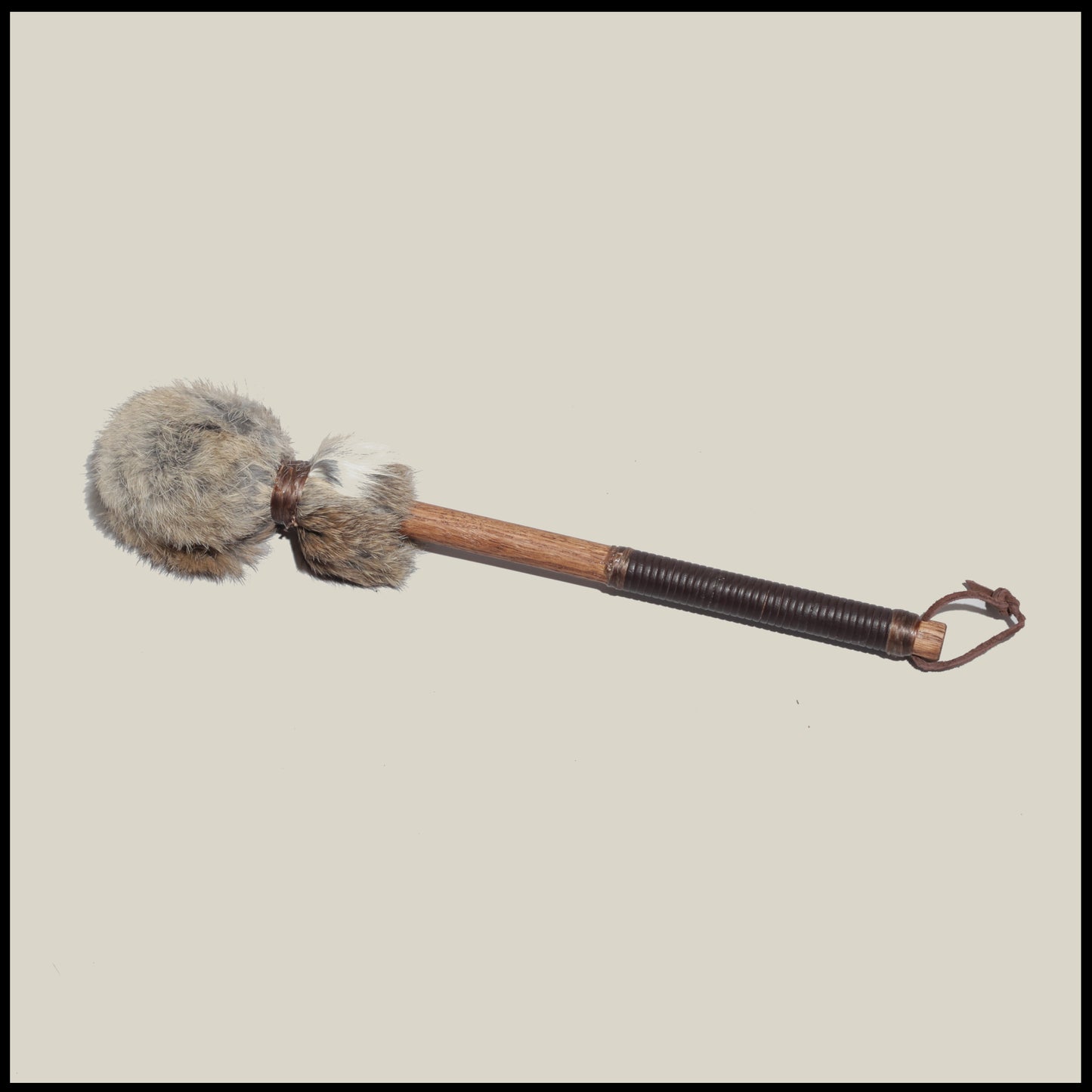 13” Soft drum beater, brown Rabbit fur, 5/8” Red Oak handle w/ brown leather wrap