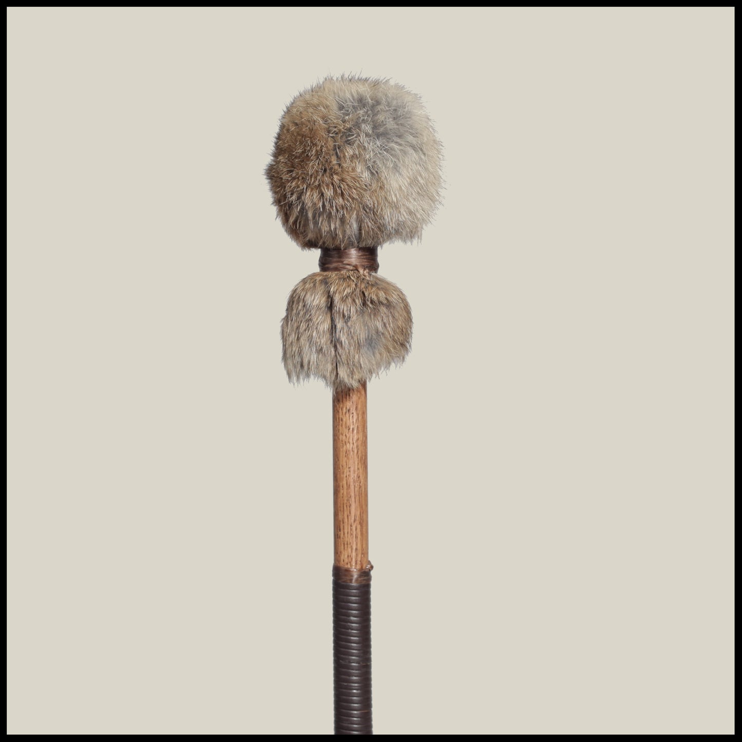 13” Soft drum beater, brown Rabbit fur, 5/8” Red Oak handle w/ brown leather wrap