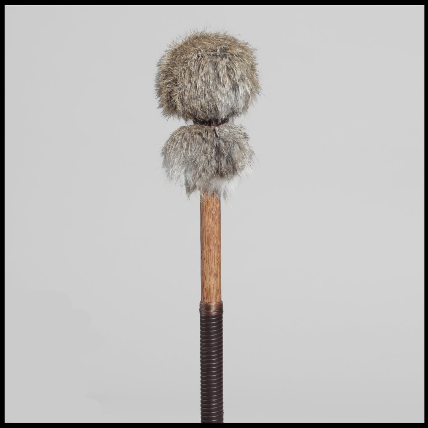 13” Soft drum beater, grey brown Rabbit fur, 5/8” Red Oak handle w/ brown leather wrap