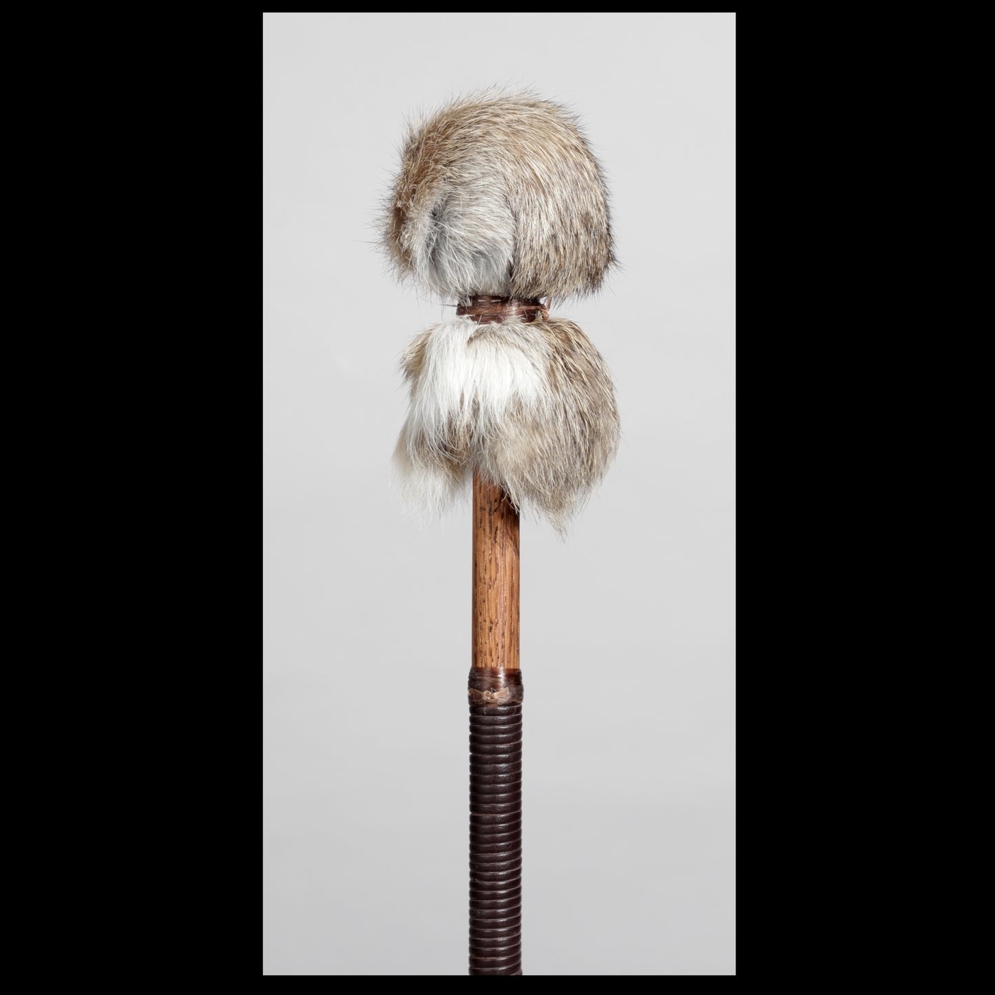 13” Soft drum beater, tan Rabbit fur, 5/8” Red Oak handle w/ brown Calf leather wrap