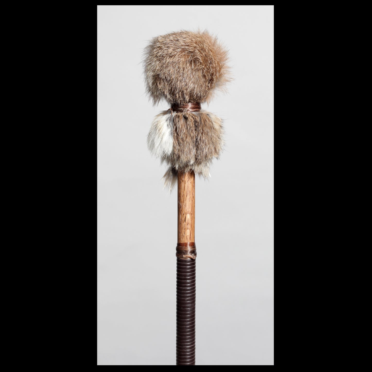 13” Soft drum beater, brown & white Rabbit fur, 5/8” Red Oak handle w/ brown Calf leather wrap