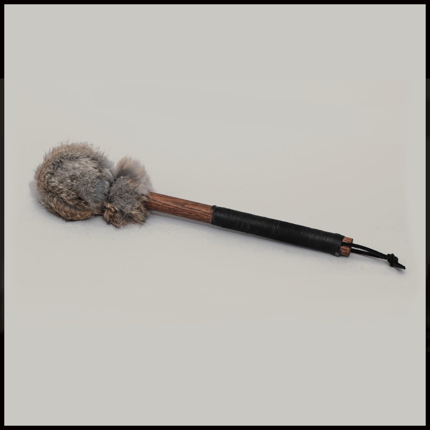 13” Soft drum beater, dark Rabbit fur, 3/4” Red Oak handle w/ black leather wrap