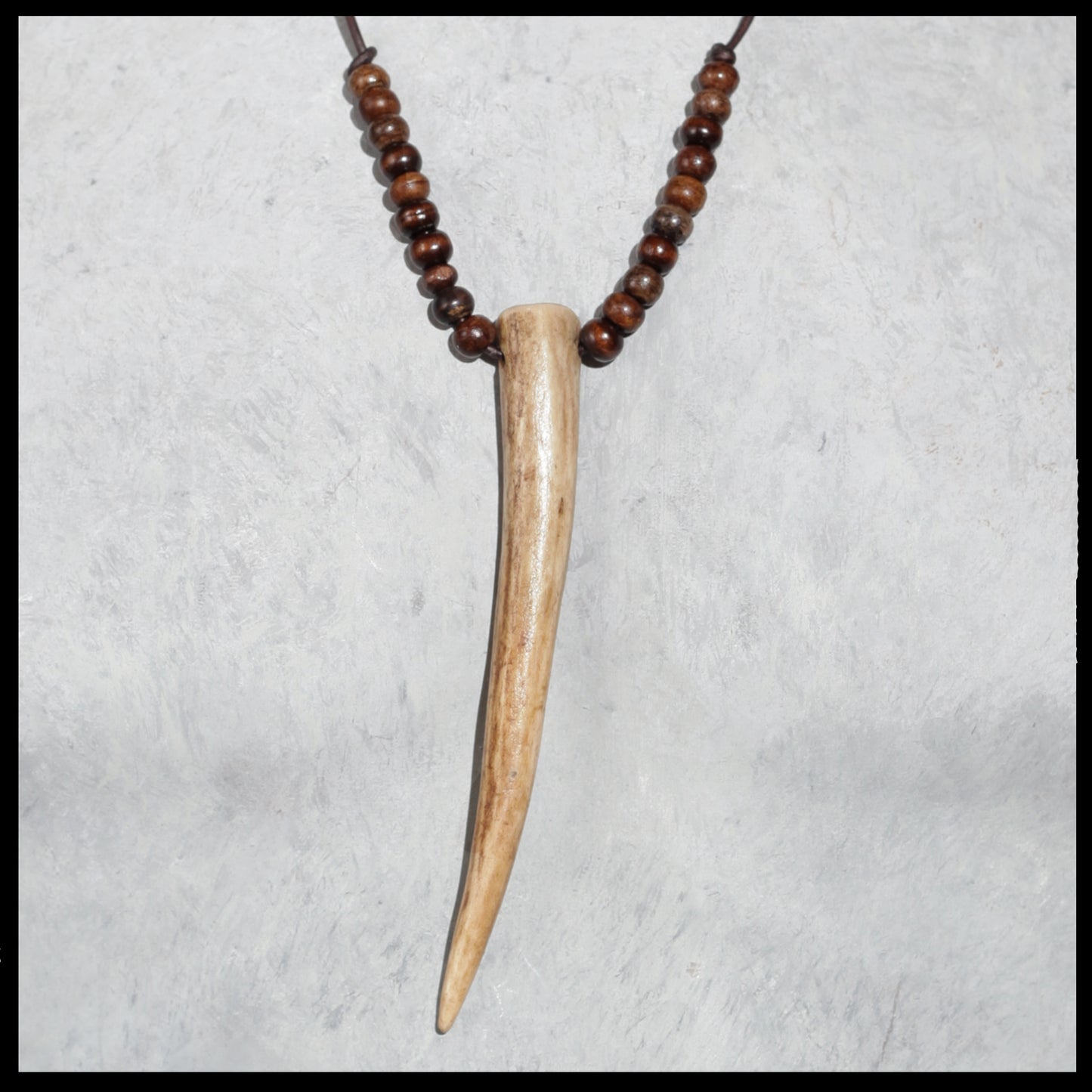 5.5” Deer antler necklace w/ brown bone & wood beads