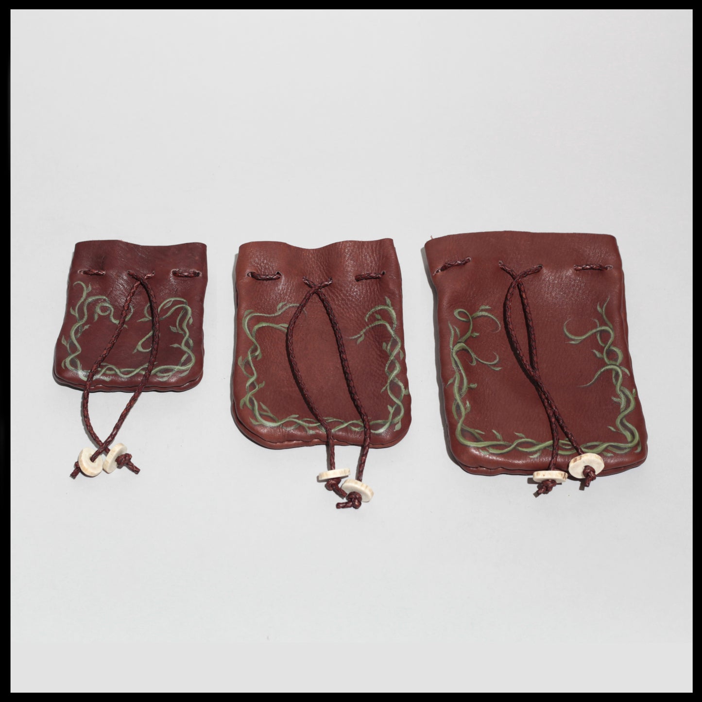 Brown "Vines" hand-painted Deer leather pouch w/ Deer antler toggles