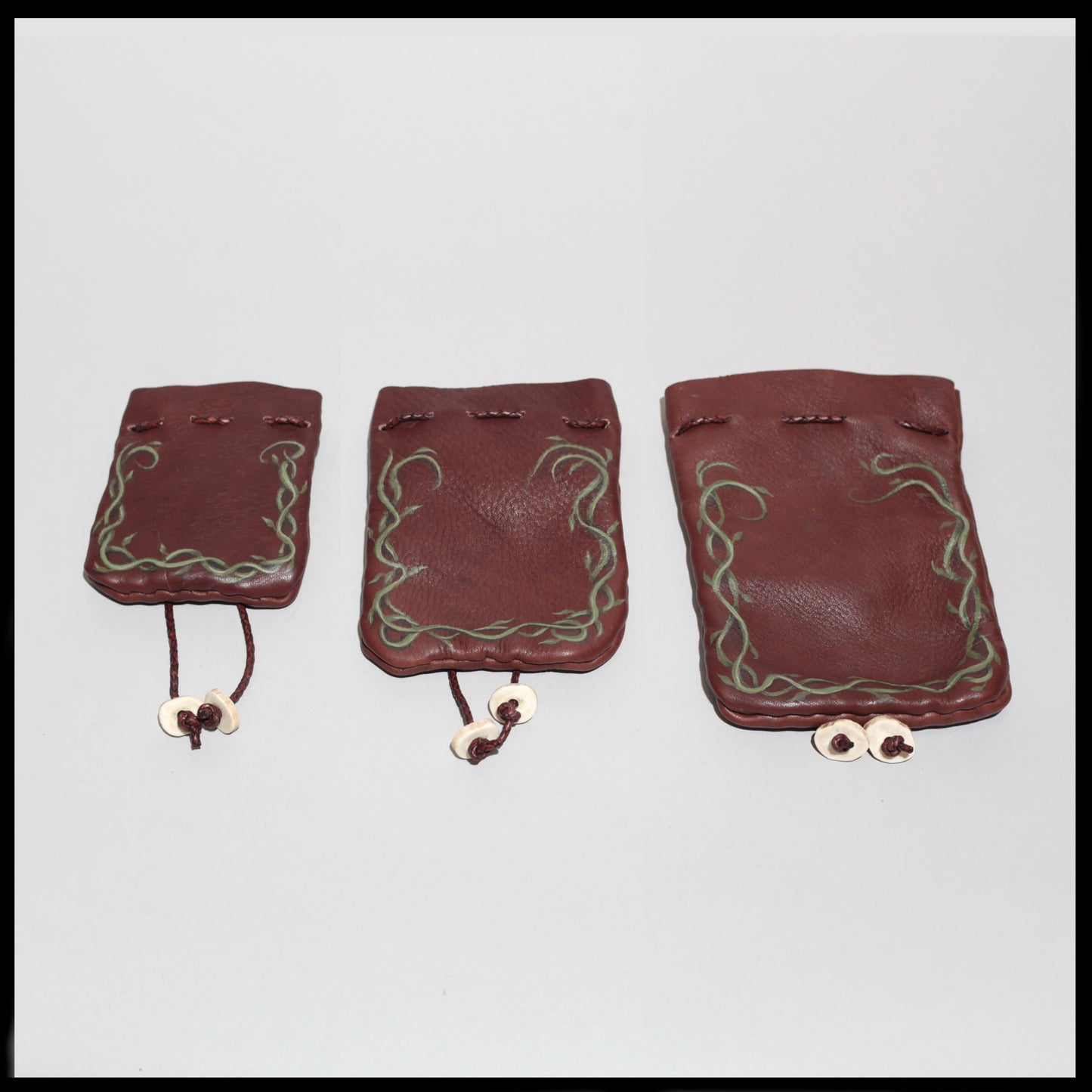 Brown "Vines" hand-painted Deer leather pouch w/ Deer antler toggles
