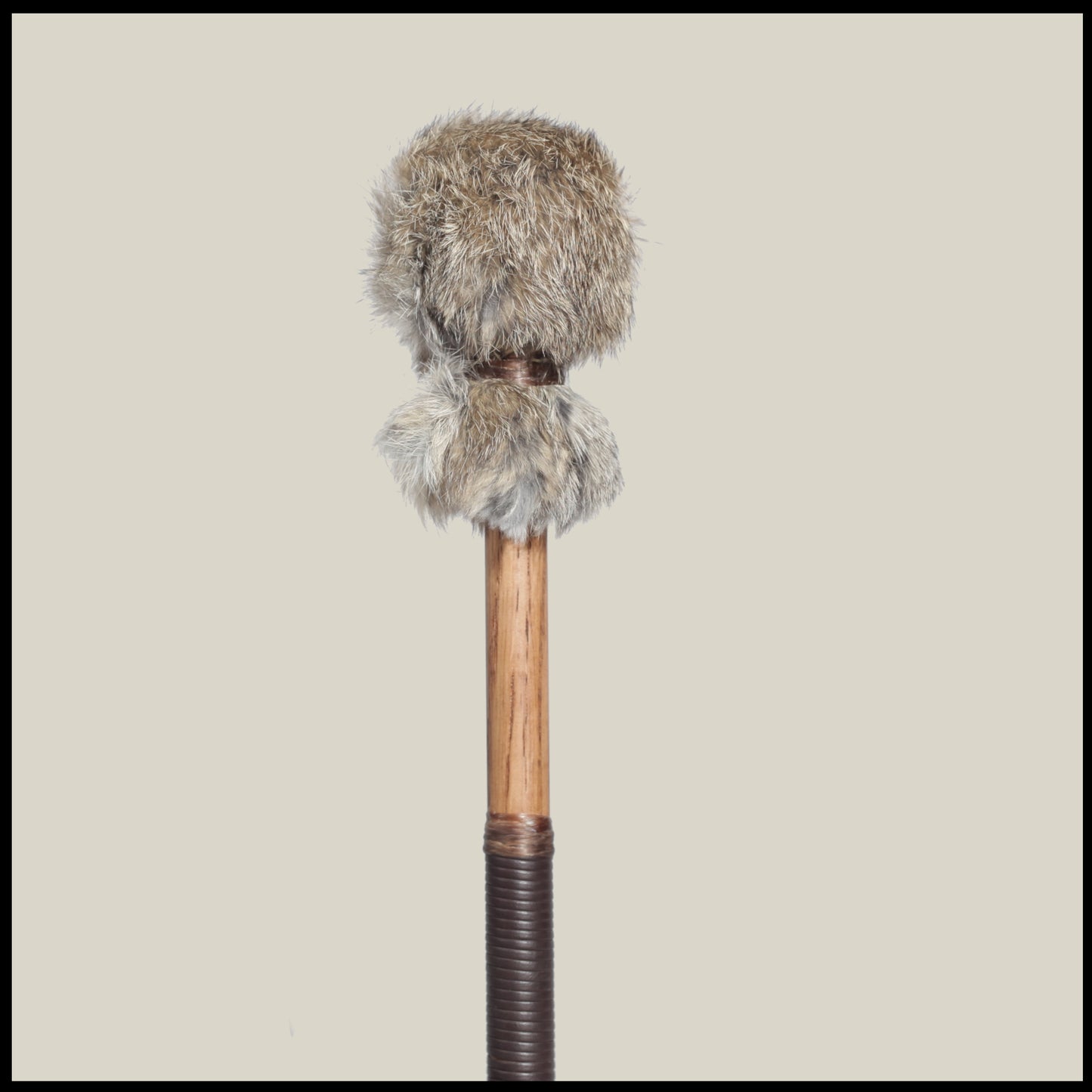 13” Soft drum beater, brown Rabbit fur, 3/4” Red Oak handle w/ brown leather wrap