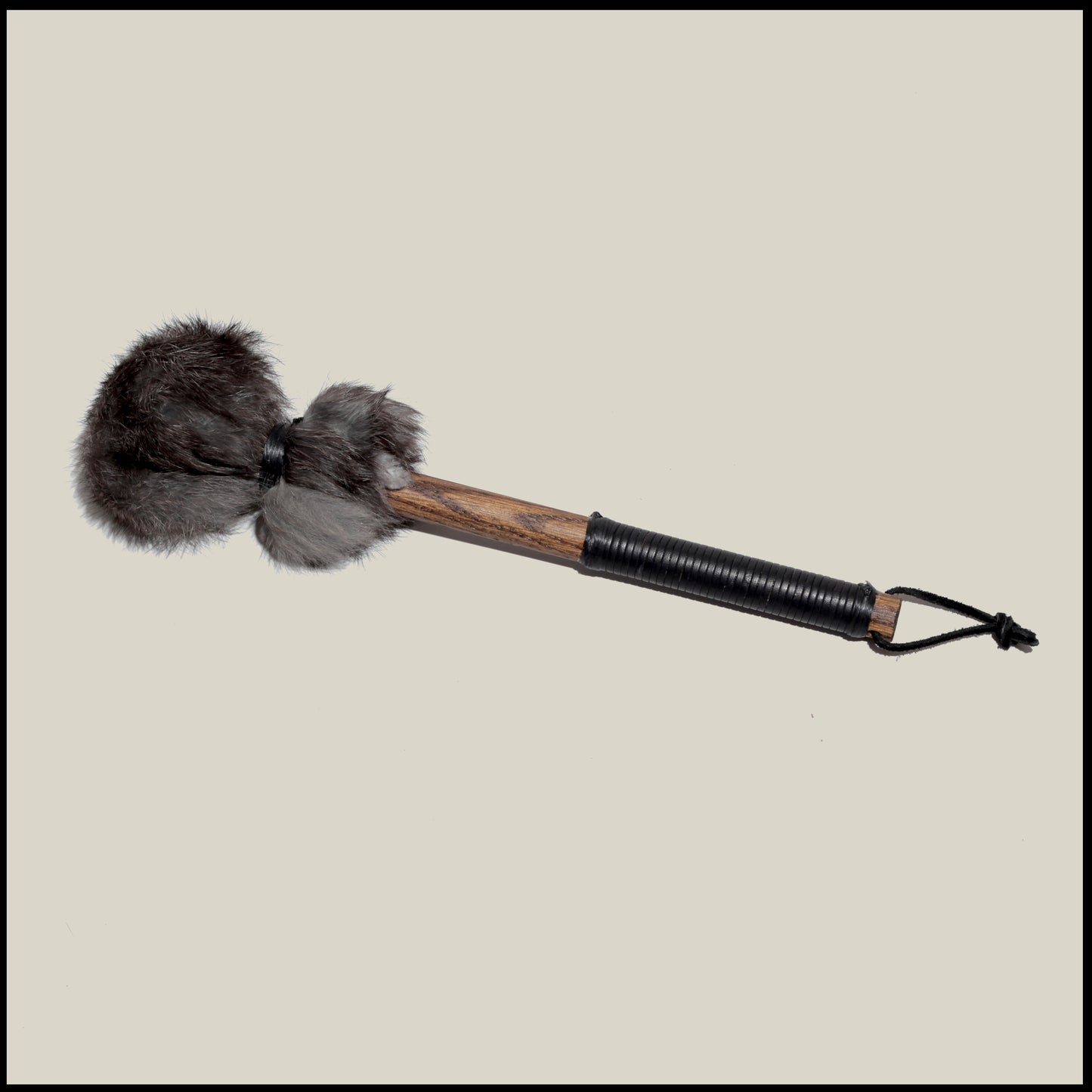 13” Soft drum beater, dark Rabbit fur, 3/4” Red Oak handle w/ black leather wrap