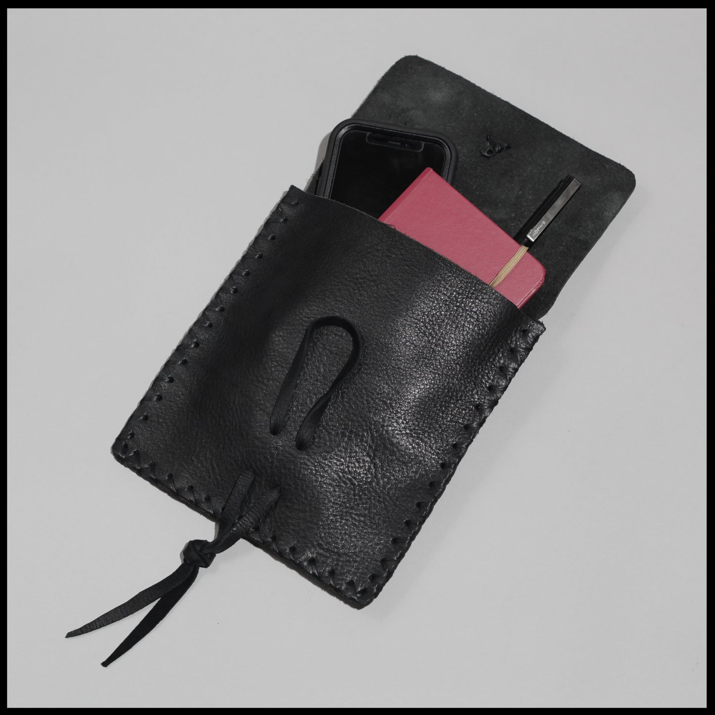 Black hand-stitched leather belt pouch w/ Elk rib closure