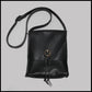 Black hand-stitched leather shoulder bag w/ hand-carved Deer antler Sun Wheel closure