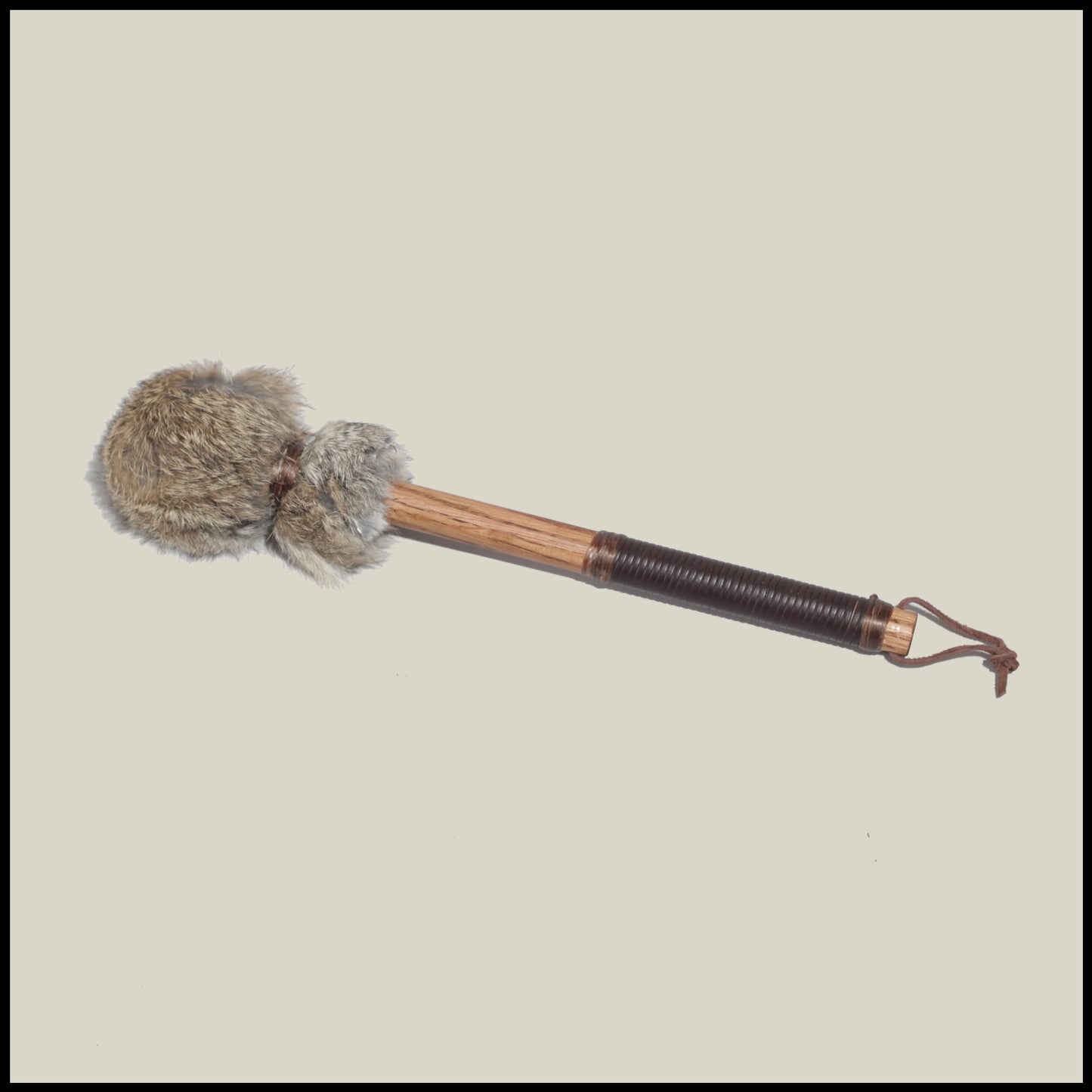 13” Soft drum beater, brown Rabbit fur, 3/4” Red Oak handle w/ brown leather wrap