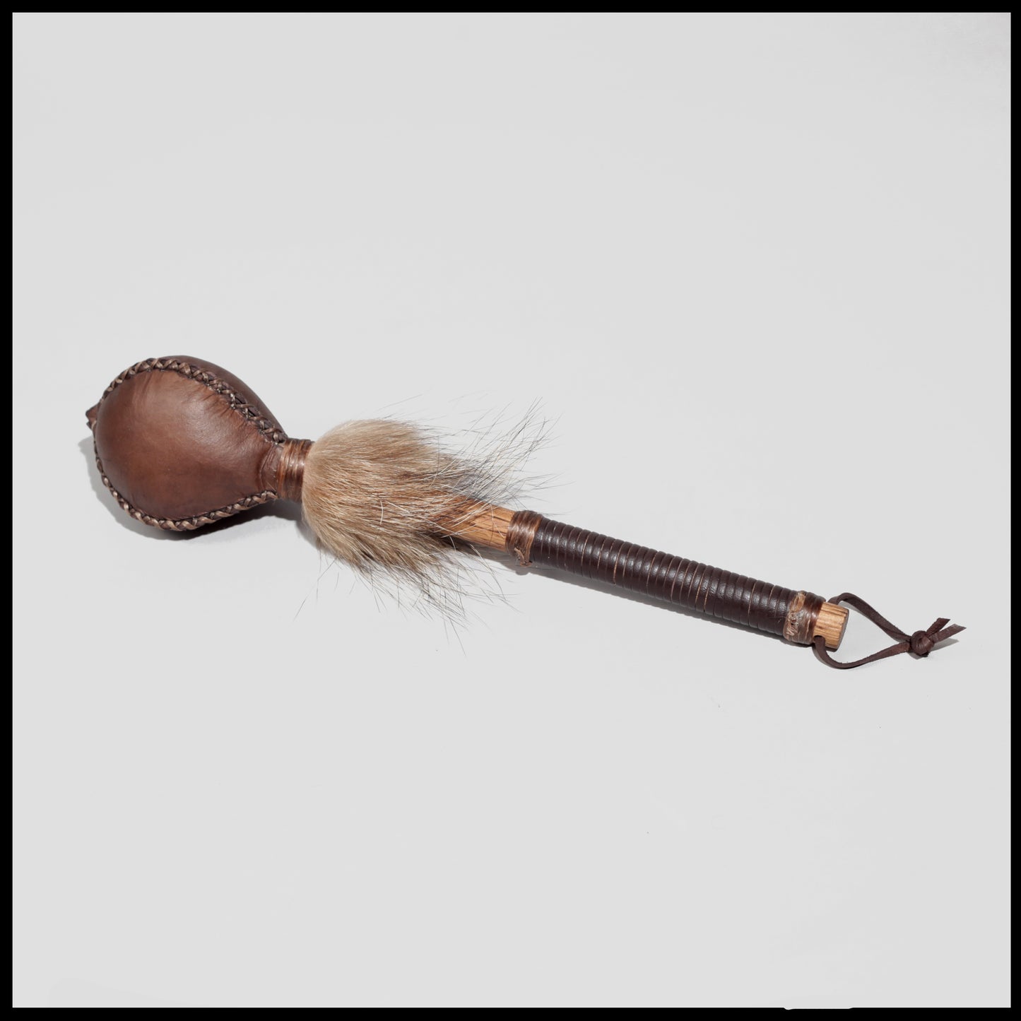 12” Brown Elk hide “3-sided” rattle w/ Coyote fur