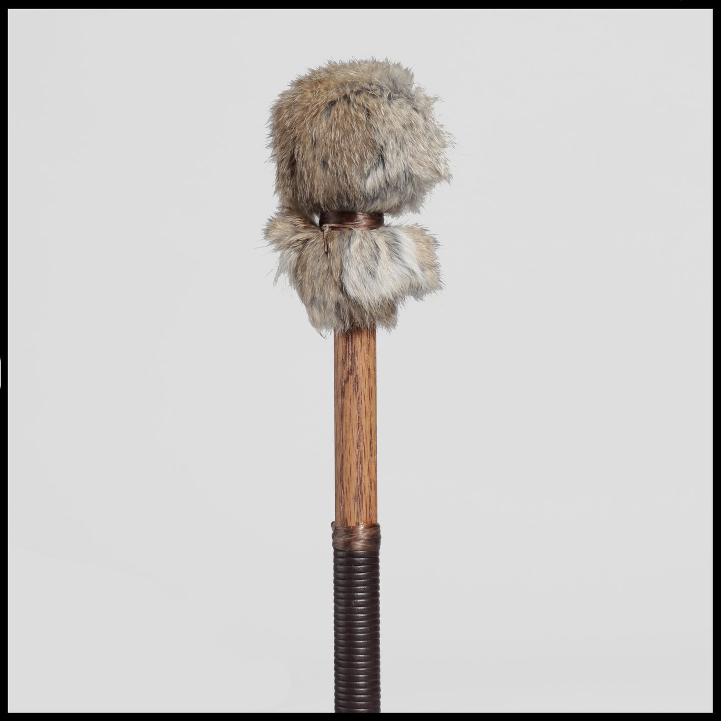 13” Soft drum beater, brown Rabbit fur, 3/4” Red Oak handle w/ brown leather wrap