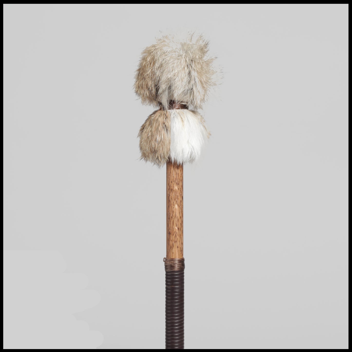 13” Soft drum beater, tan & white Rabbit fur, 5/8” Red Oak handle w/ brown leather wrap