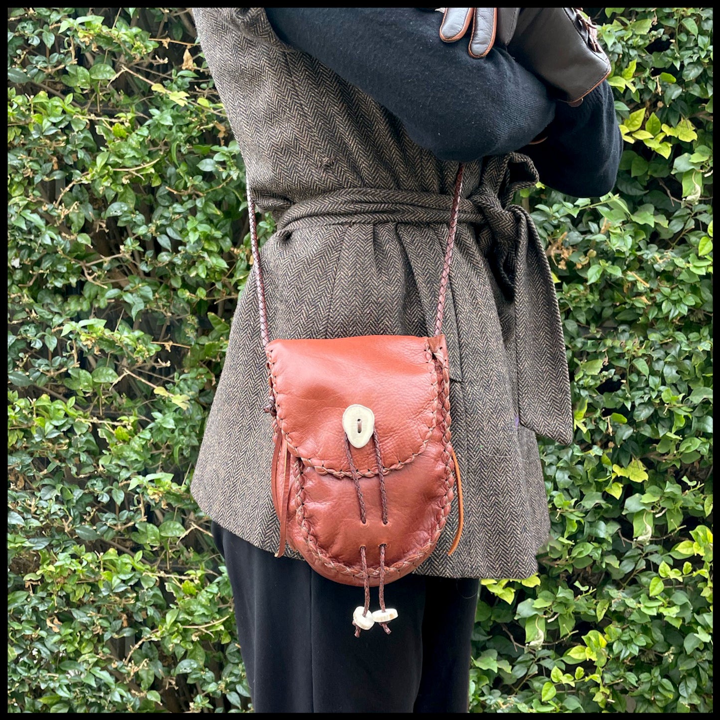 Hand-stitched leather shoulder pouch w/ Deer antler toggles & closure