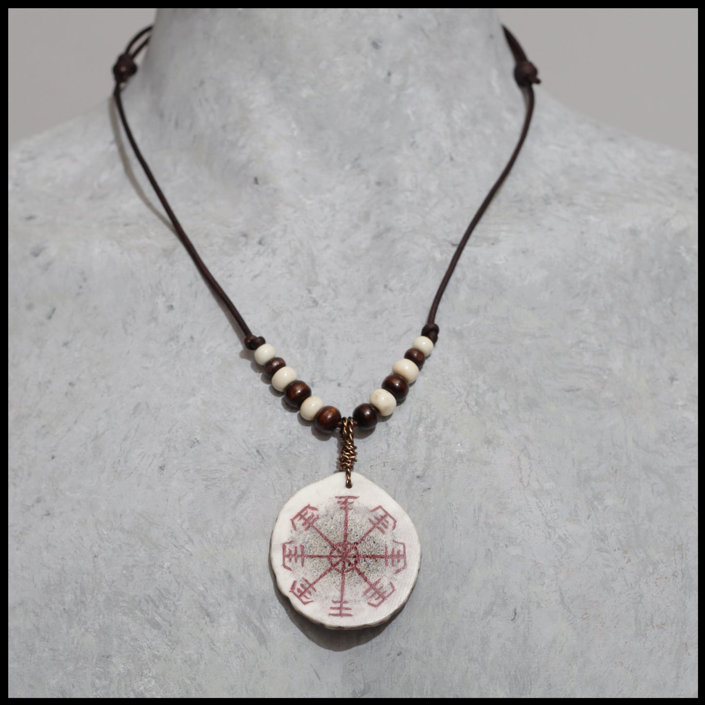 Handpainted “Lukkustafur” (to prevent bad luck) pendant on Elk antler necklace