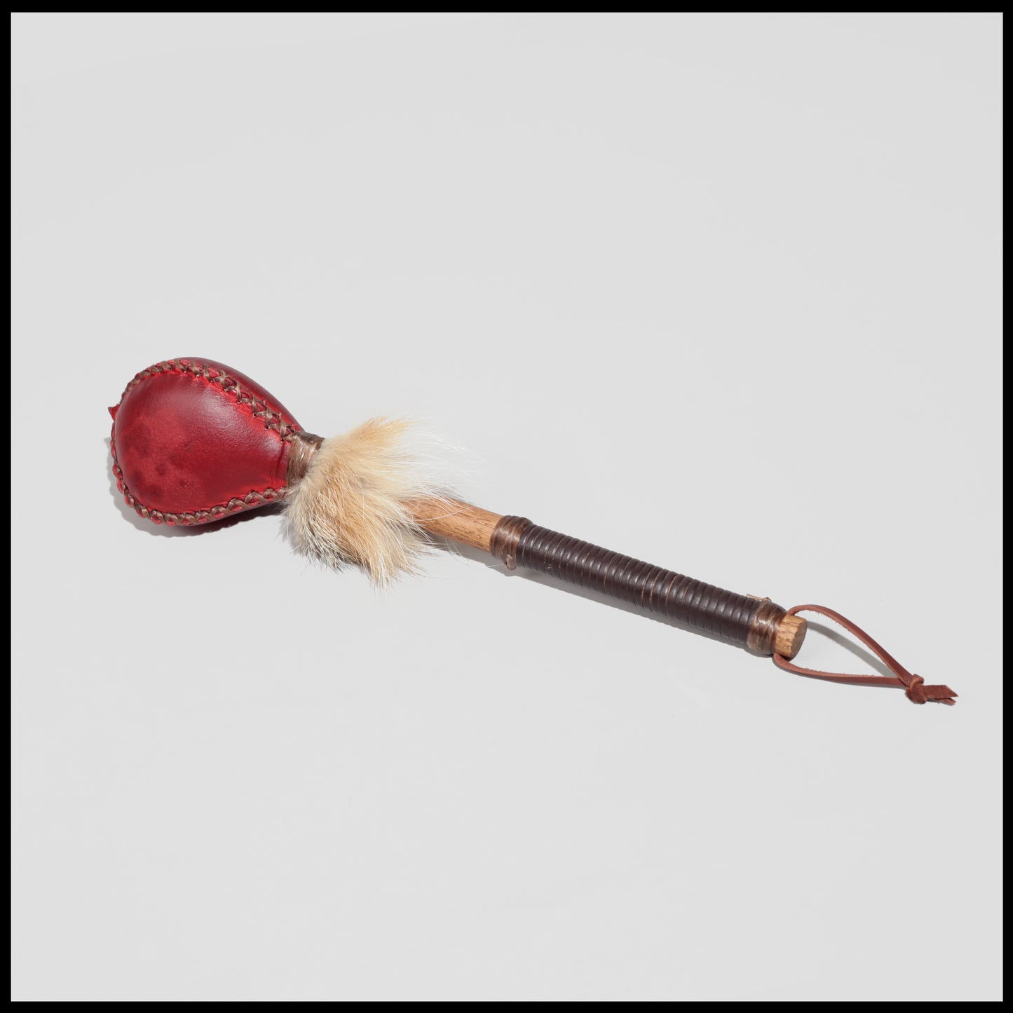 12” Crimson Deer hide “3-sided” rattle w/ Fox fur