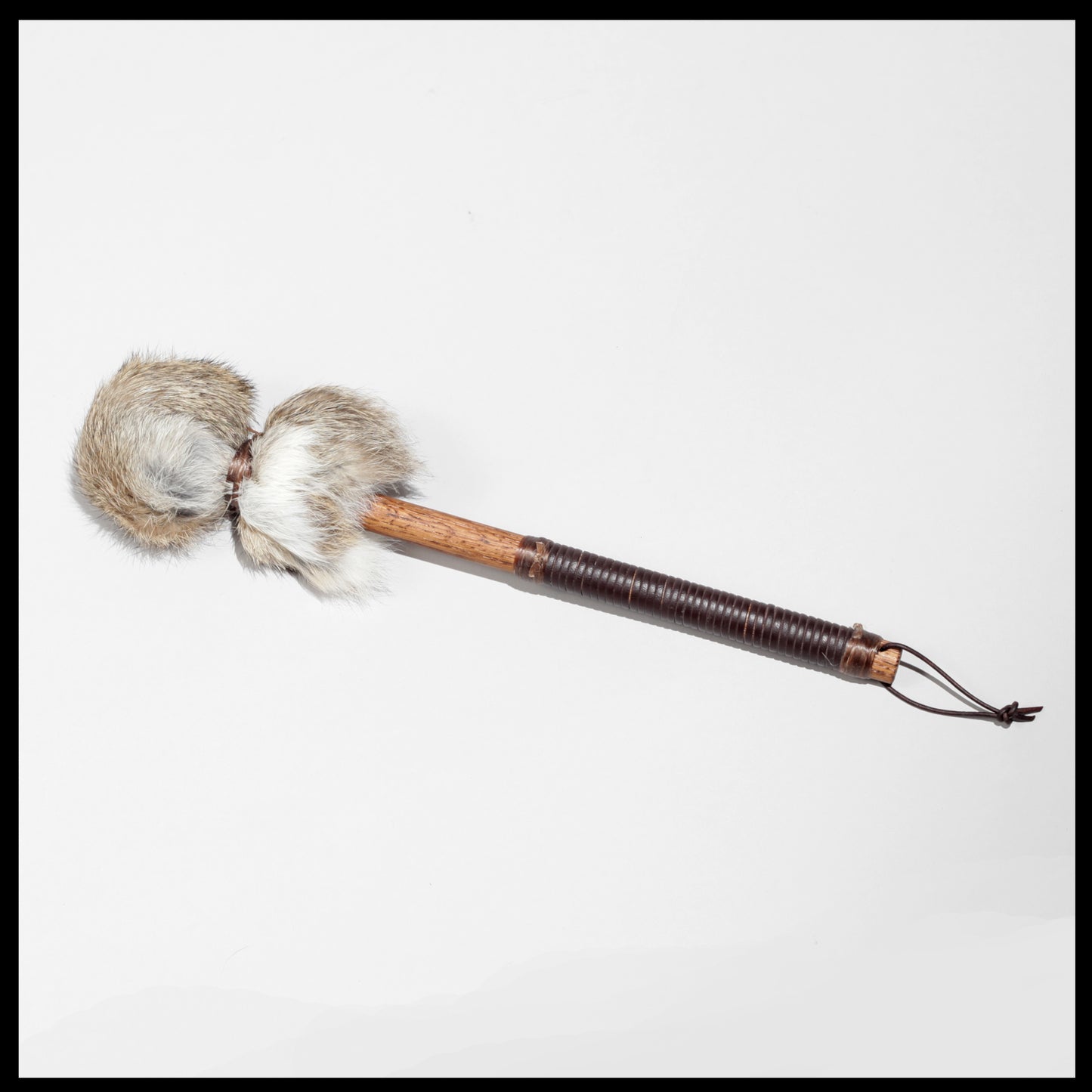 13” Soft drum beater, tan Rabbit fur, 5/8” Red Oak handle w/ brown Calf leather wrap