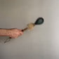 15” Dark green Elk hide “teardrop” rattle w/ Coyote fur