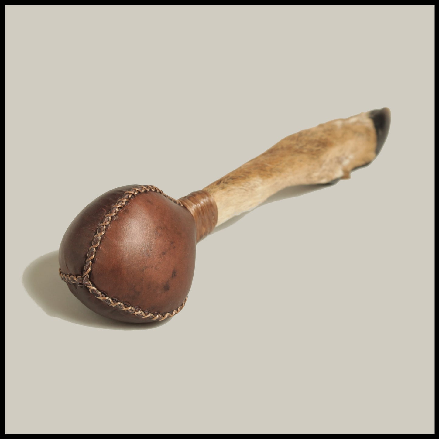 15” Brown Deer hide “3-sided” rattle w/ aged Deer foot handle