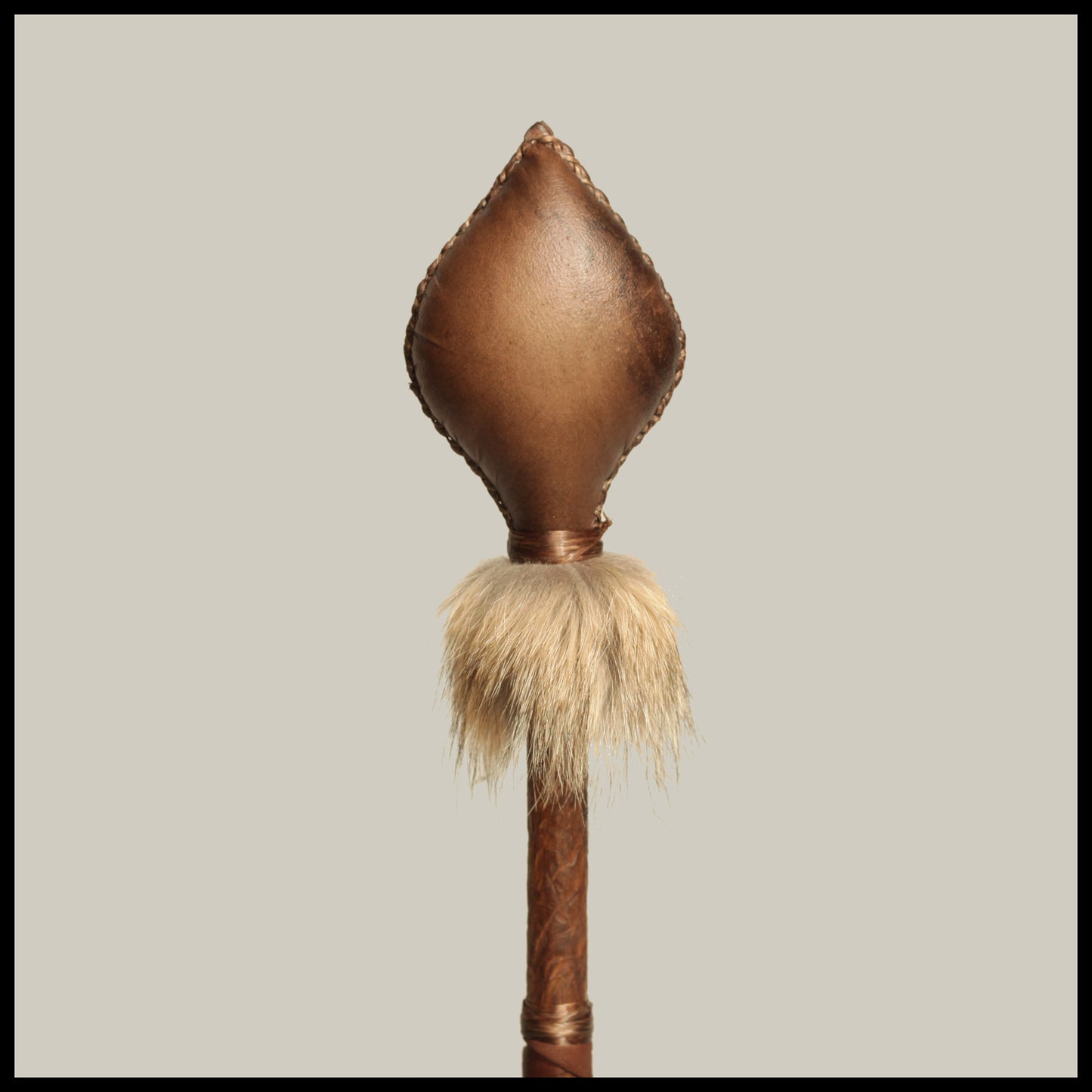 17” Brown Deer hide “spade” rattle w/ Coyote fur