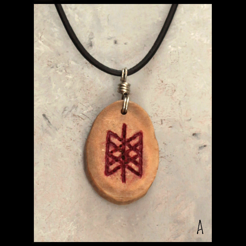 Handcarved "Web of Wyrd" on Deer antler necklace